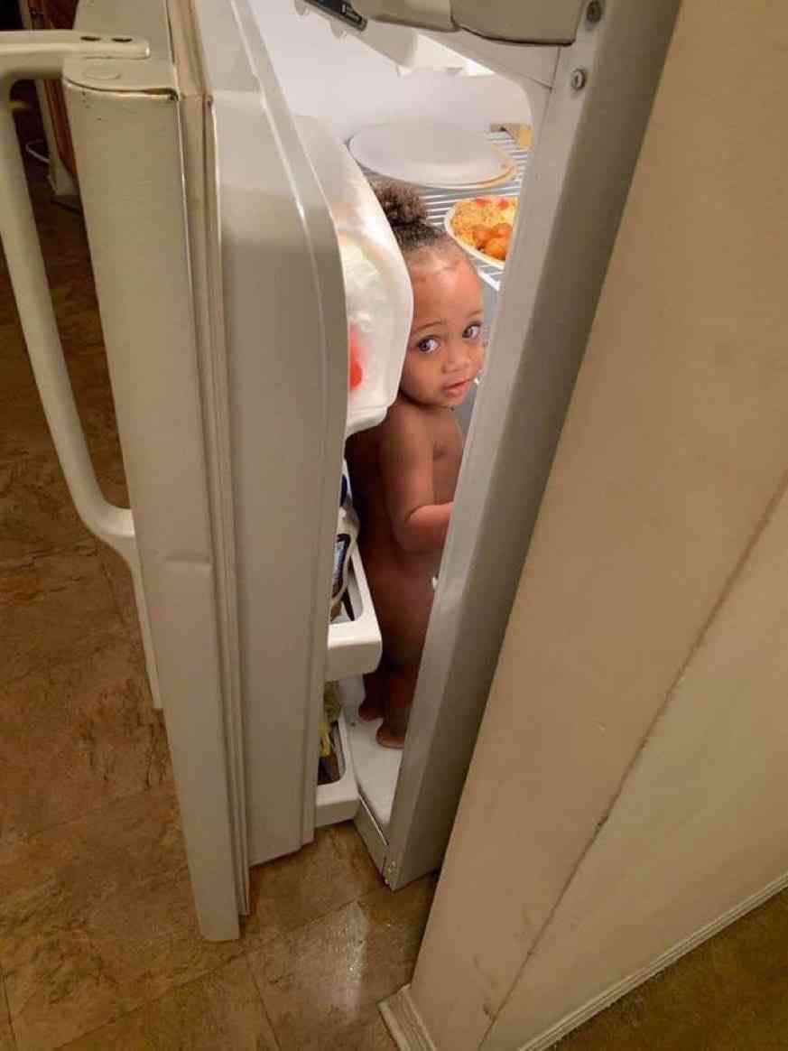 Kids can be so unpredictable. This one is chilling in the fridge 😯😯 - MirrorLog