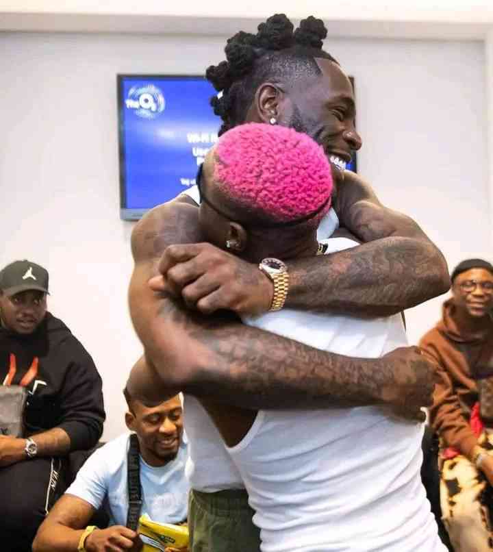 Rare picture of Burna Boy giving Ruger a warm hug.  This looks lovely 💯 - MirrorLog